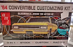 AMT 1200 64 Kit Personalizzazione Convertibile Oldsmobile Cutlass Modello Plastica NUOVO - Foto 1 di 1