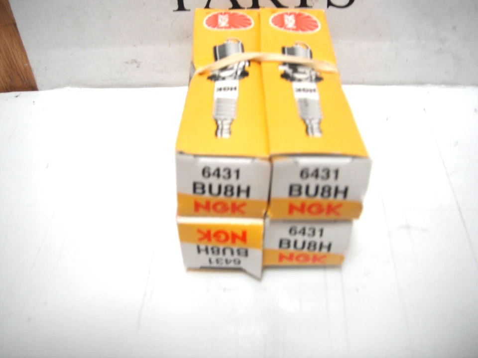 NEW NGK BU8H / 6431 spark plug surface gap pack of 4 outboard marine boat - Image 1 of 1