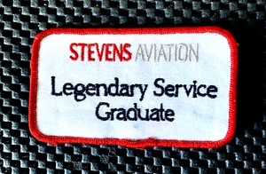 STEVENS AVIATION LEGENDARY SERVICE GRADUATE EMBROIDERED SEW ON PATCH 4" x 2 1/4" - Picture 1 of 2