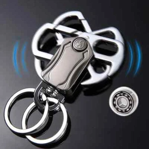 Portachiavi Fidget Spinner Multifunzione 2pz Metallo con Apribottiglie e Coltello - Foto 1 di 6