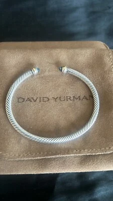 Brazalete de plata de ley 925 con topacio azul y cable trenzado Foto 1 de 4