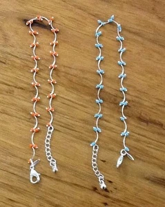 AVON SLIP LINK ARMBAND X 2 ORANGE BLAU PERLEN VERSILBERT - Bild 1 von 8