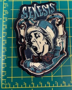 GENESIS MAD HATTER CUT OUT LOGO SEW OR IRON ON PATCH OFFICIALLY LICENSED - Picture 1 of 7
