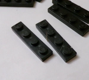 Placas Mega Bloks x24 negras 1x4 (021-53) - Imagen 1 de 1
