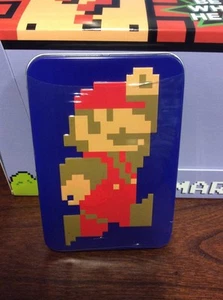 Super Mario Bros 8 bits metal lata Nintendo con Mario Mints 1,23 oz - Imagen 1 de 11
