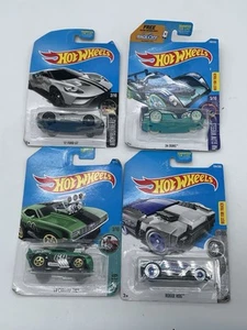 Lot Of 4 Hot Wheels 24 Ours HW Glow Wheels Rouge Hog 69 Camaro 17 Ford GT New - Picture 1 of 9