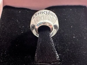 2025 DISNEY PANDORA CHARM DISNEYLAND MURANO GLASS WHITE BEAD SPACER 70TH SLEEVE - Picture 1 of 4