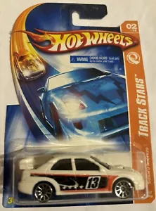 HOT WHEELS ~TRACK STARS SUBARU IMPREZA ~ #2/12 ( WHITE & BLACK TAMPOS ON SIDES ) - Imagen 1 de 1