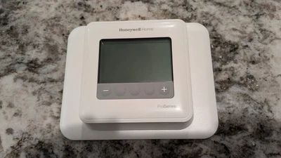 Honeywell ProSeries TH4110U2005 Programmable Thermostat with Wall Plate & Screws - Image 1 of 4