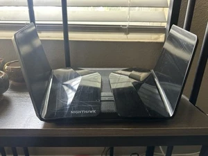 NETGEAR Nighthawk RAXE500 AXE11000 Tri-Band WiFi 6E Router & Arris SB8200 Modem - Picture 1 of 8