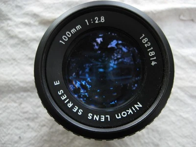 Nikon Nikkor 100 mm f 2,8 AI Série E : petit téléobjectif argentique, léger. - Photo 1/4