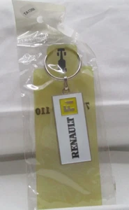 TA1288 PORTE CLE PUBLICITAIRE RENAULT F1 TEAM BLANC Ref 7711220110 - Imagen 1 de 4