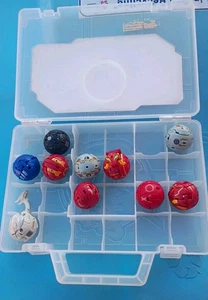 Bakugan Battle Brawlers custodia rigida trasparente e palline multicolore lotto di 10 - Foto 1 di 3