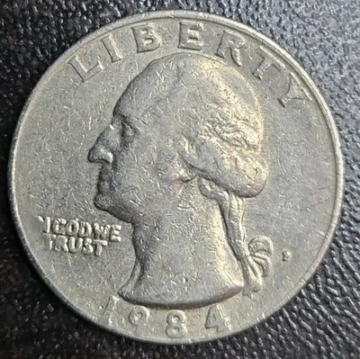 Cuarto P 1984 "P" como nuevo error lleno, letras cabeza de águila fusionada y más raro Foto 1 de 4