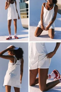 Free People Movement Hot Shot Mini Dress Built in Shorts Sz L White Pockets NWOT - Picture 1 of 11