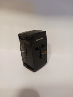 Samsonite todo en uno, adaptador de viaje de corriente Australia, China, Estados Unidos, Europa y Reino Unido  Foto 1 de 4