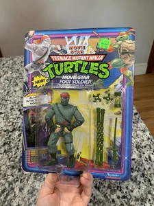 Figura de acción coleccionable Foot Soldier estrella de cine TMNT 1992 sin perforar - nueva en caja - Imagen 1 de 9