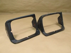 🥇86-92 TOYOTA SUPRA MK3 JUEGO DE 2 FAROS DELANTEROS EMBELLECEDOR BISEL CUBIERTA OEM - Imagen 1 de 13