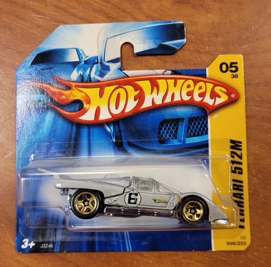 HOT WHEELS FERRARI 512M SILVER WITH GOLD WHEELS  2006 SHORT CARD # 05/38 - Image 1 of 1