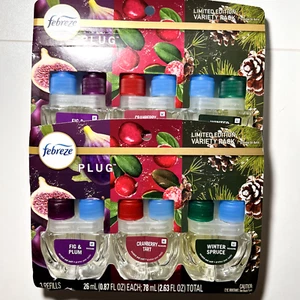 Febreze Enchufable Higo Arándano Invierno Abeto Ambientador Set, Lote de 2 - Imagen 1 de 1