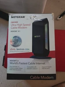 NETGEAR CM1000v2 DOCSIS 3.1 Modem kablowy przetestowany i działający - Zdjęcie 1 z 2