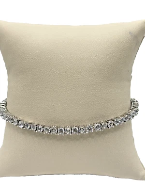 Pulsera de tenis tono plateado con pedrería redonda transparente 7,5" Foto 1 de 4