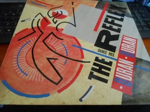 Duran Duran - "The Reflex (Dance Mix) / Make Me Smile" - EMI 12" Single - Picture 1 of 4