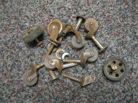 Vintage lot of 5 Wooden Casters ~ 2 hard rubber & 1 metal with extra parts 3 pla Cover