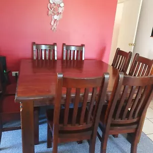 Used Solid Dining Table with 8 Chairs $500 - Picture 1 of 4
