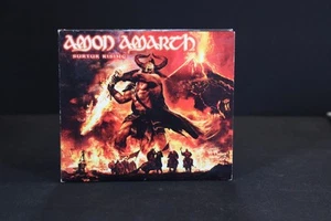 Amon Amarth: Surtur Rising (CD + DVD, 2011, 2-Disc Set) Metal Blade - Bild 1 von 2