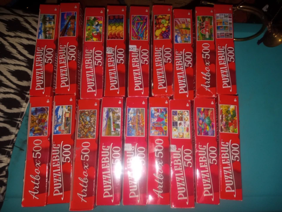 Lote de 18 rompecabezas surtidos de un ávido coleccionista abiertos y sin probar Foto 1 de 4