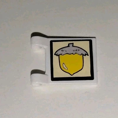 LEGO White 2x2 Clip On Flag with Spongebob Sandy Acorn Sticker Part # 2335pb031 - Image 1 of 2