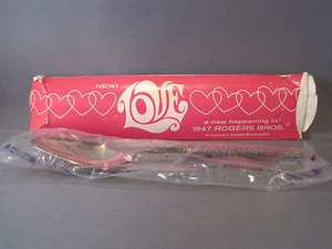 "LOVE '' 1847 ROGERS BROS TEA SPOON IN ORIGINAL PACKAGE SILVER PLATED W/ STORY - Picture 1 of 7