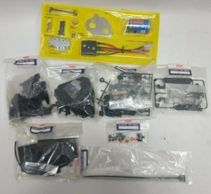 vintage Kyosho Outrage ST 1:10 #30329 Replacement Parts Bags 2-7,9 & Motor Parts - Picture 1 of 8