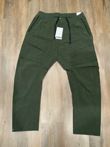 Nuovi pantaloni cargo Nike Sportswear Tech Pack Repel Woven BV4443 355 da uomo taglia XL - Foto 1 di 12