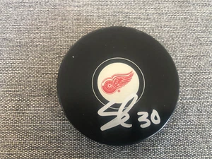 SEBASTIAN COSSA AUTOGRAPH PUCK DETROIT RED WINGS/GRAND RAPIDS GRIFFINS - Picture 1 of 1