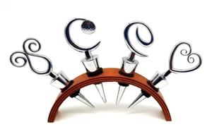 Vintage Decorative Stainless Steel Bottle Stoppers In MCM Wood Arch Display - Picture 1 of 9