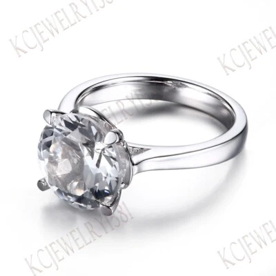 Elegante anillo fino de boda único de topacio blanco de corte redondo 925 astilla de ley para dama  Foto 1 de 4