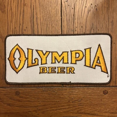 Vintage NOS Embroidered OLYMPIA BEER Large 9" X 4" Patch Uniform Back Patch Oly' - Image 1 of 3