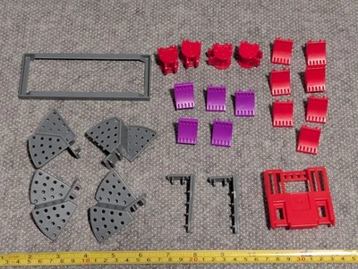 Lote De Piezas Rokenbok Aleatorias Gris Paso Rojo Bisagra Bloque Púrpura Ménsula Foto 1 de 4