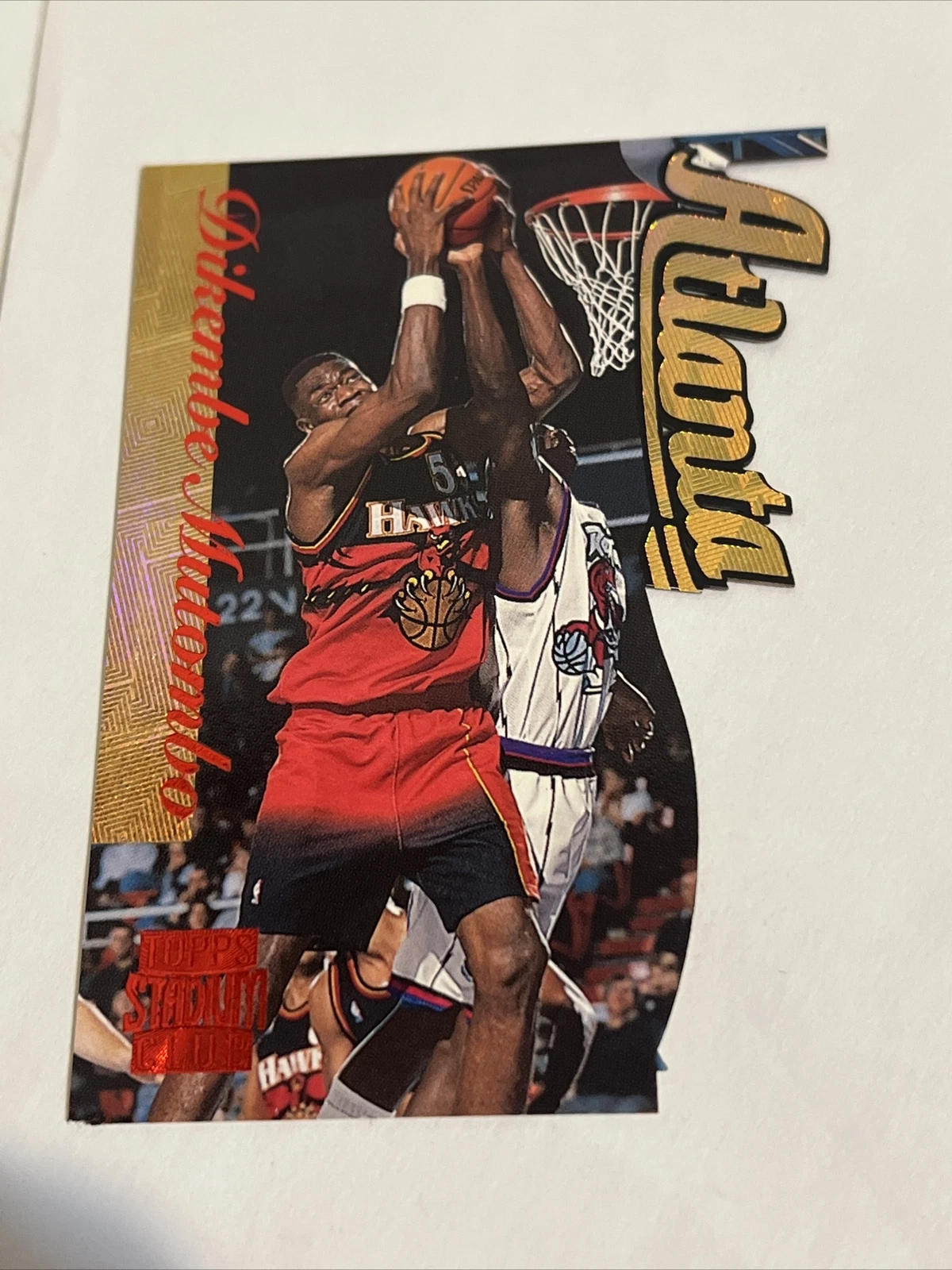 1996-97 Topps Stadium Club Fusion Die-Cut Dikembe Mutombo - Atlanta Hawks