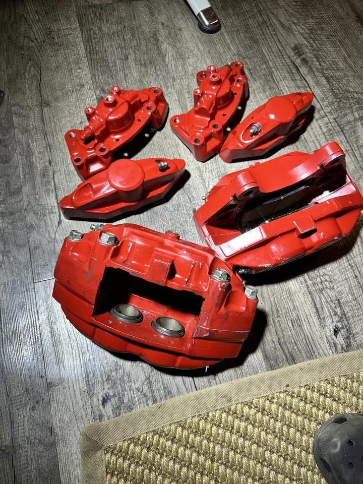 INFINITI NISSAN 2007-2022 OEM FRONT REAR LEFT RIGHT AKEBONO BRAKE CALIPERS (SET) - Image 1 of 4