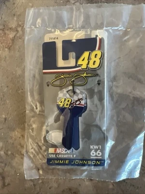 Lot of 2 NASCAR #48 Jimmie Johnson keychain and a house key - Image 1 of 2