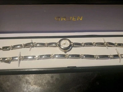 Reloj GR7687S Gruen Mujer Plateado y Piedras Nuevo Batería Dos Bandas Con Estuche Foto 1 de 4