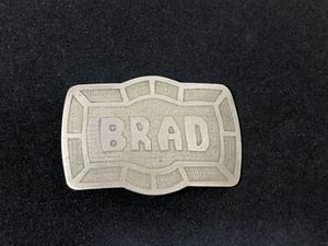 Brad! We Found Your Messing Gürtelschnalle klein Designer unsigniert 70er Jahre Vintage - Bild 1 von 3