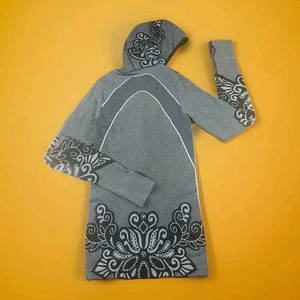 Top a compressione Athleta donna piccolo grigio floreale senza cuciture torsione fori pollice palestra - Foto 1 di 15