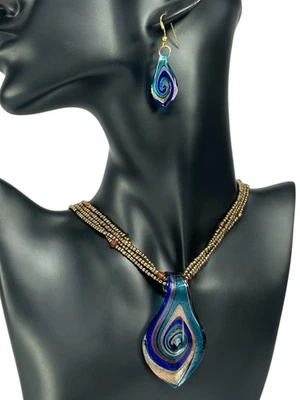Juego de collar y pendientes colgantes de vidrio remolino de oro azul lágrima latón cuentas naranjas Foto 1 de 4