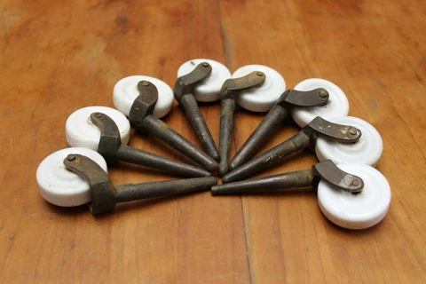 Vintage 1.625" Diameter x .5" x 4.12" Porcelain and Metal Furniture Casters (x8) Cover