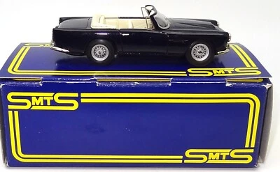 1:43 SMTS ASTON MARTIN DB4 КАБРИОЛЕТ - БЕЛЫЙ МЕТАЛЛ - НОВОМ В КОРОБКЕ - Изображение 1 из 4