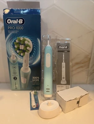 Cepillo de dientes eléctrico Oral B CrossAction verde caja abierta - sin usar Foto 1 de 4